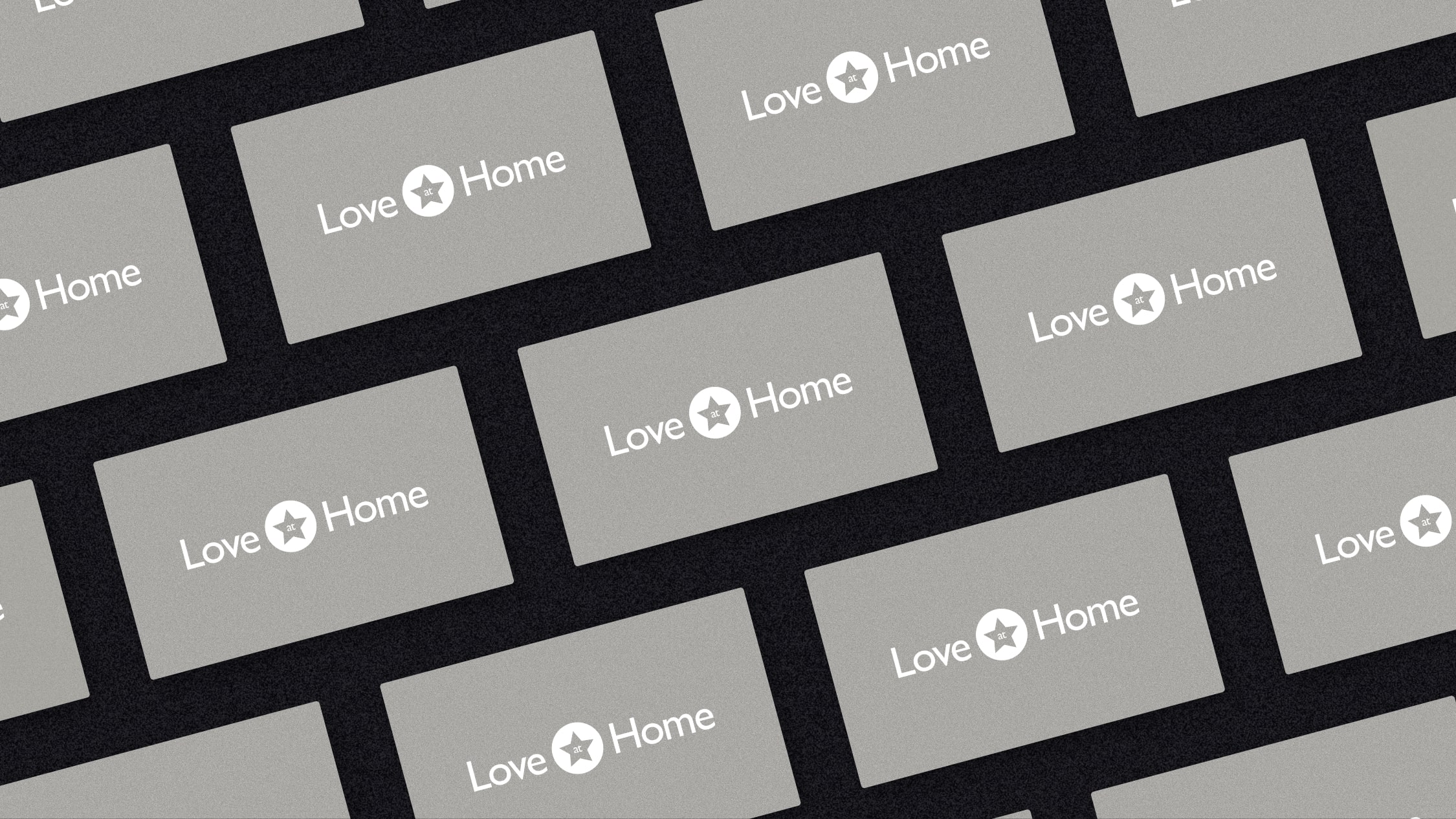 Love at Home beige business cards grid on a dark grey background